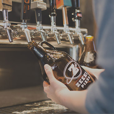 Filling up Zeeks Pizza Beer Growler